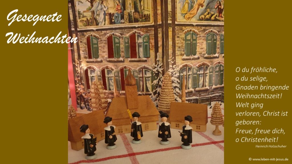 e-cards zu Weihnachten Weihnachtzeit christliche e-cards O du fröhliche Weihnachtslied Holzfiguren Sänger Chor Kurrendesänger besonders stimmungsvolle e-card
